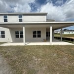 Screen walls to a covered lanai