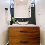Custom black walnut vanity in 1/2 bath