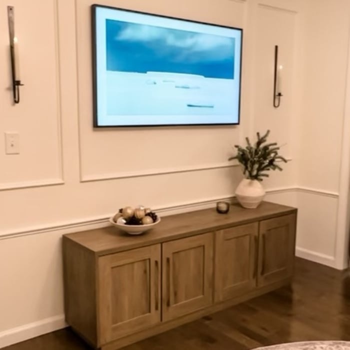 New trim to accentuate the walls and new AV boxes to hide cords.