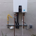 Install new tankless water heater