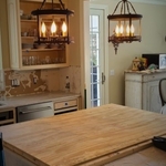 New fixtures installed. Previous fixture location patched for drywall finish repair work. Lights 100% functional and a great accent for the kitchen!