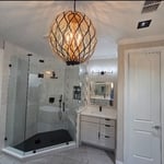 light fixtures, shower, vanity and floor