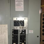 Portable generator panel interlock