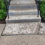 This is the front of the steps, before the Gardner Construction team resurfaced the steps and replaced the sidewalk.