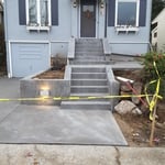 New retaining walls, porch, steps, walkway and driveway in Northeast Seattle