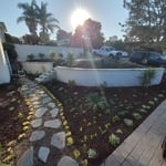 Wall and two levels of landscaping