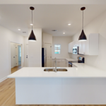 New kitchen construction (including new floors, cabinets, lighting and paint).