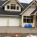 Siding and arches install, poured concrete slab driveway, also.