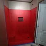 Removed tub, rebuilt for new tile, waterproofing with regard.