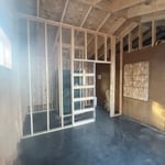 Framed up addition, shingled cabin, installed windows, and soffit and fascia