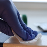 Collecting a windowsill Sample for analysis.