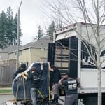 Loading the grand Piano with a custom built 6 wheel off road dolly