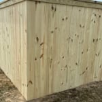 back left corner of fence from outside the fence