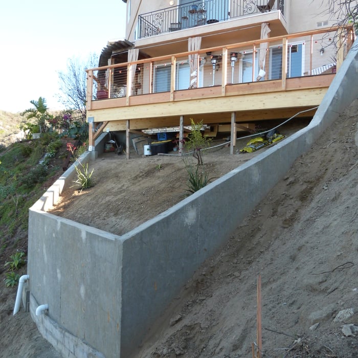 Deck Expansion and Slope Failure with Retaining Wall