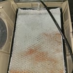 Old filter with hard water build-up