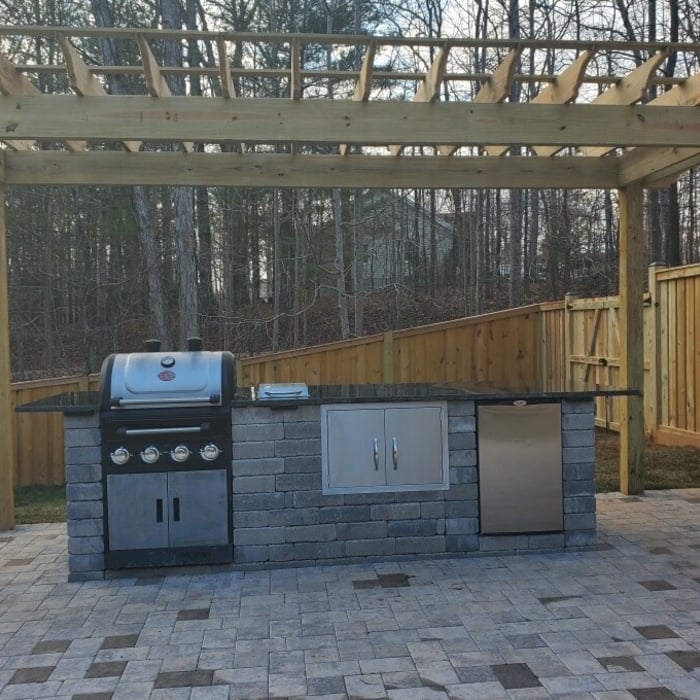 Outdoor kitchen and a pergola