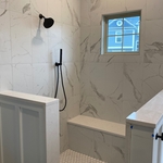 Master Bath Shower with heated floor in shower and bath area. Top Notch Tile