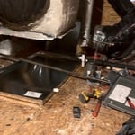 Clean pan ready for the new furnace and coil