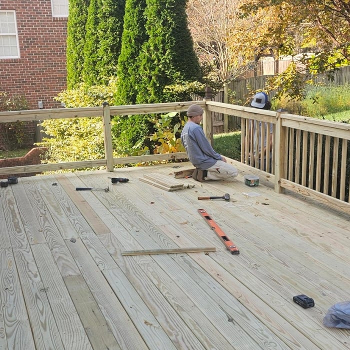 New decking boards and handrails and supports along with post toppers
