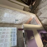 Tiled shower with accent