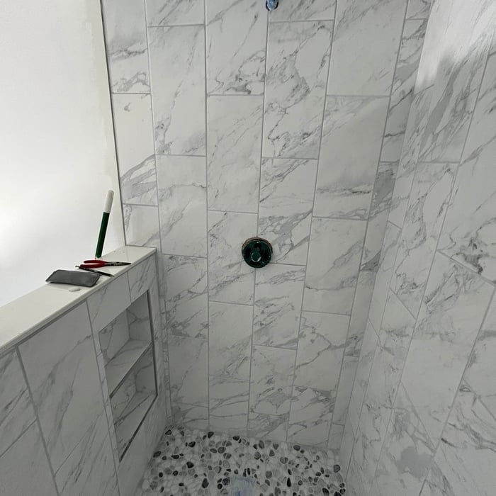 Tile shower with custom niche