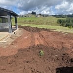 Spreading topsoil