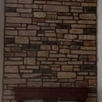 Stone veneer fireplace