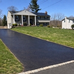 Driveway sealcoated crack filled