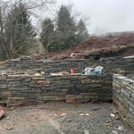 Dry laid terrace retaining walls, work in progress