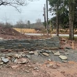 Dry laid bluestone retaining wall, work in progress