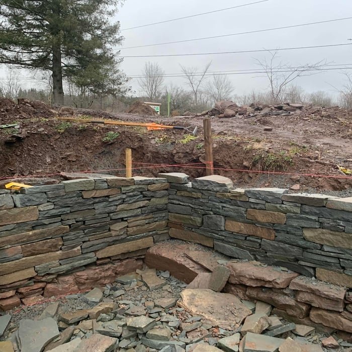 Dry laid bluestone retaining wall