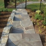 flagstone on old concrete walkways