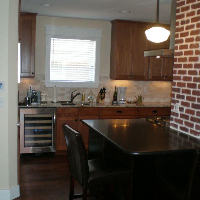 Contemporary Kitchen - Cozy Loft Medium Wood Stained Cabinets