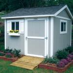 Traditional Garden Shed - Grey Wood Yellow Flowers In Planter