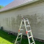 Power washing siding