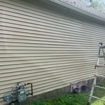 Power washing siding