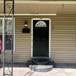 Power washing siding