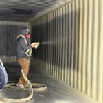 applying 2-inches closed- cell spray foam