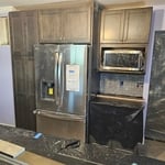Toaster oven and light switches boxes.