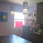 Pendant lighting over island.