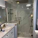 Glass shower enclosure