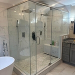 Glass shower enclosure