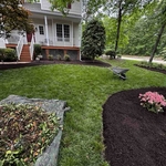 Fresh mulch installed and property cleanup.