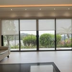 Motorized roller shades