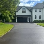 Driveway sealcoating