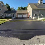 Driveway sealcoating