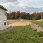 Grading excavation and re