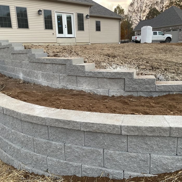 Grading excavation and re