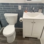 All new fixtures, vanity, and toilet installed.