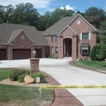 standard concrete driveway with decorative borders